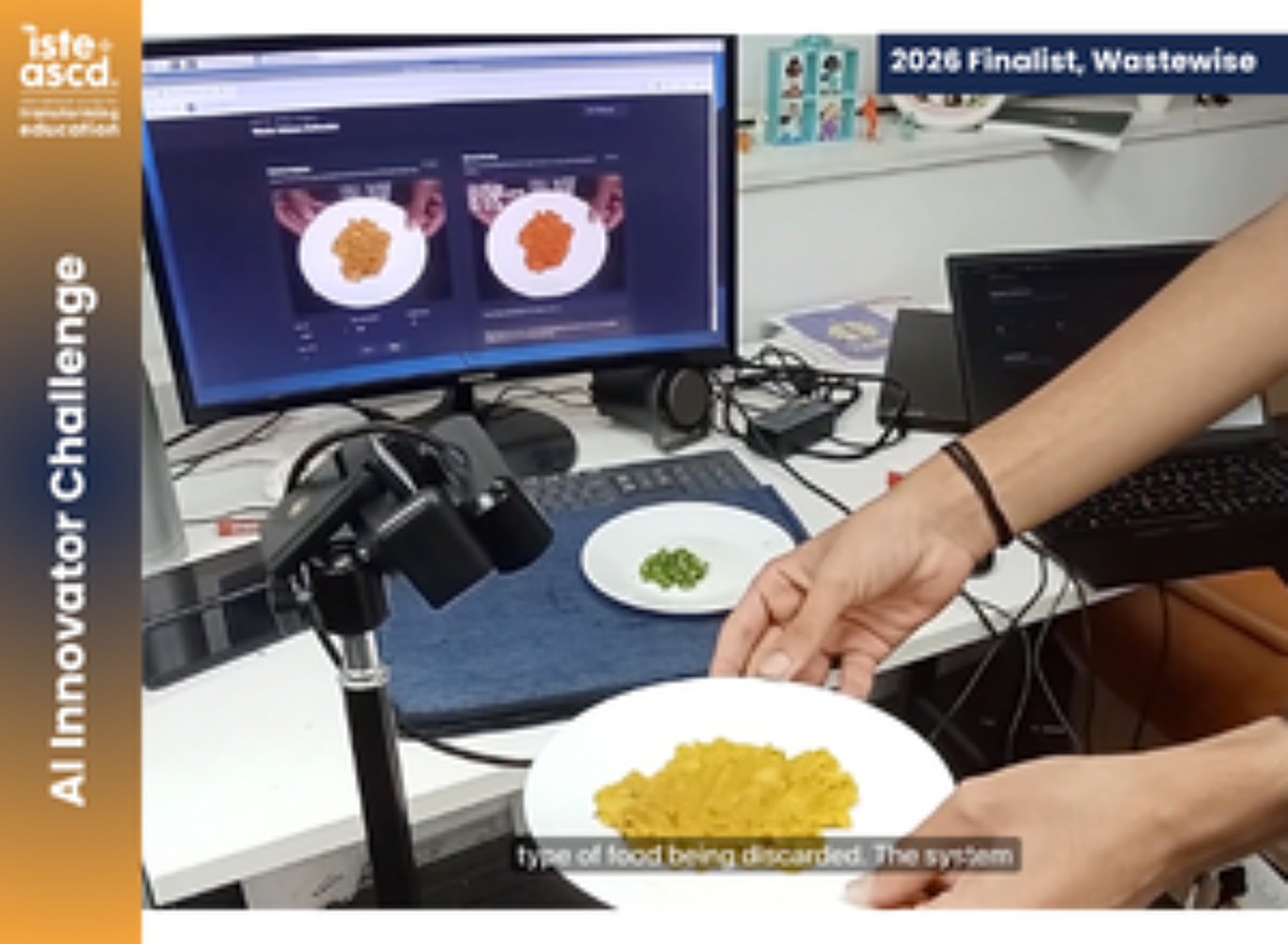 A person holds a plate of yellow food near a camera, with a plate of green food nearby. Computer screens in the background display images of plated food. Image is labeled 2026 Finalist, Wastewise, AI Innovator Challenge..